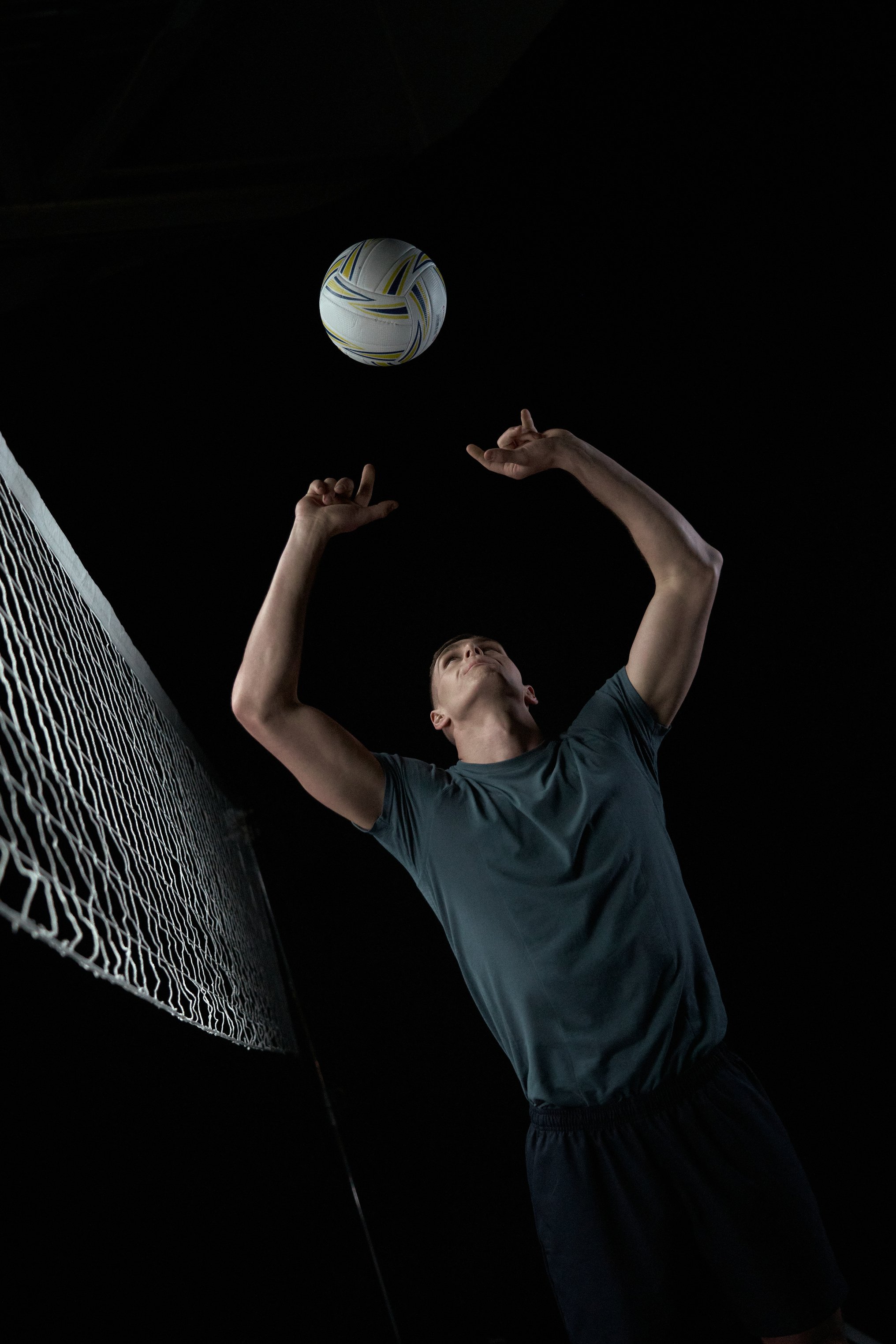 Low Angle Shot of a Man Playing Volleyball